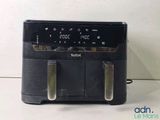 an image of a microwave with a digital clock on it