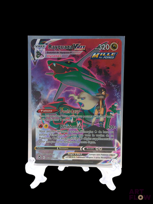 the pokemon card is displayed on a stand in front of a black background