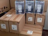 many boxes stacked on top of each other on the floor
