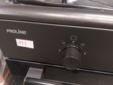 a black stove top with two burners on it