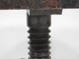 an image of a close up of a table with a wooden table top