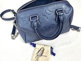 louis vuitton blue leather handbag with silver hardware and pouch