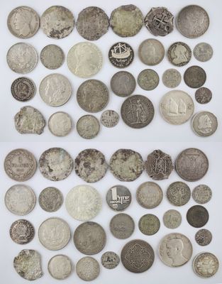 a collection of silver and silver coins from around the world