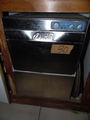 an image of a dishwasher with a price tag on it