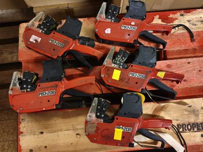 several chainsaws that are sitting on a pallet