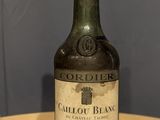a bottle of wine that is sitting on a table