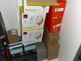 many boxes stacked on top of each other in a closet
