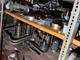 many different types of machinery on the shelves