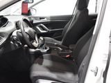 the interior of a car with a steering wheel and a dashboard