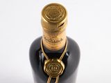 a bottle of liquor that is sitting on a table