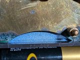 a close up of a battery in a metal case