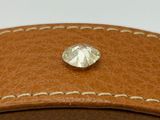 an image of a close up of a bag with a diamond on it