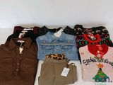 a lot of clothes that are on a table