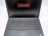 the lenovo laptop is open and ready to be used