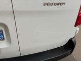 a white van with the word peucect on it