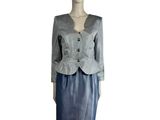 grey jacket and skirt on a mannequin mannequin mannequin mannequin mannequin mannequin mannequin mannequin manne