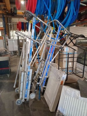 a lot of hoses that are sitting on a cart