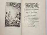 an open book with a picture of a man and woman on it