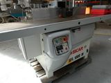 a machine that is sitting on a pallet in a warehouse