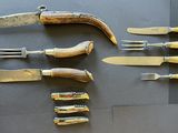 five different types of knives on the table