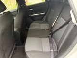 the back seats of a car with a seat belt in a car