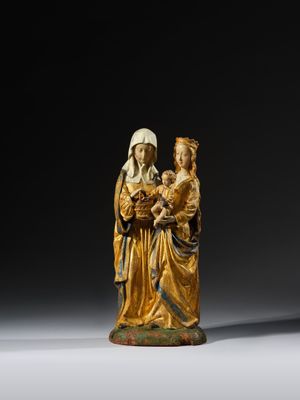 an image of a statue of a woman holding a child