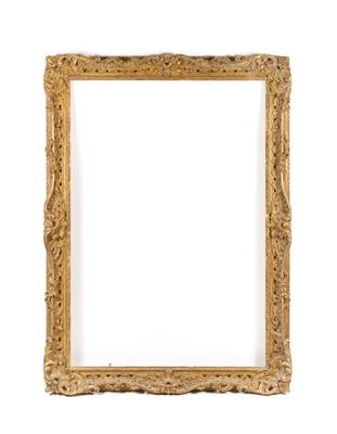a gold frame on a white wall with a white background