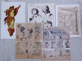 some old comics are laying out on a bed next to a sheet of paper