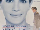 french movie poster of a man walking a dog in front of a woman ' s face