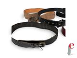 three belts with buckles on each side of them on a white background