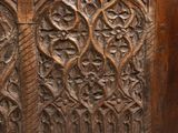 an old wooden chest with carvings on the front and sides