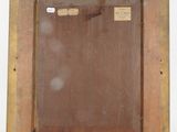 an old picture of a wooden frame with a label on it