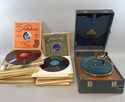a lot of old records in a case on the table