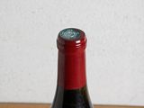 a bottle of wine that is sitting on a table