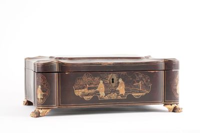 a small wooden box with a painting on it