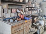 a garage with a lot of tools on the shelves