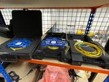 many different types of electronics on a shelf
