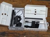 a box with a charger and a charger inside of it