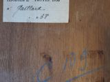 a sign on the door of a room that has a name on it