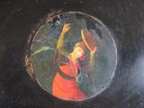 a painting of a woman in a red dress on a black surface
