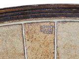 an image of a close up of a wall with a clock on it