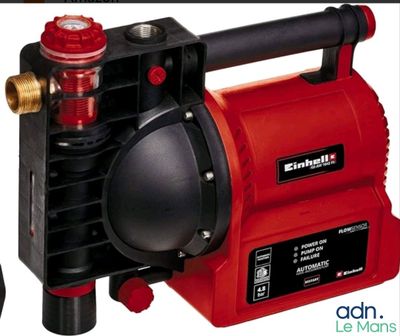 a red and black pump with a hose attached to it