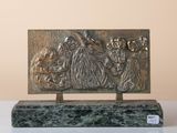 bronze sculpture of a group of monkeys sitting on a marble base