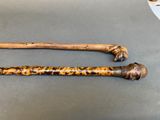 two canes that are sitting on a table