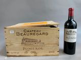 a wooden box with a bottle of wine next to it
