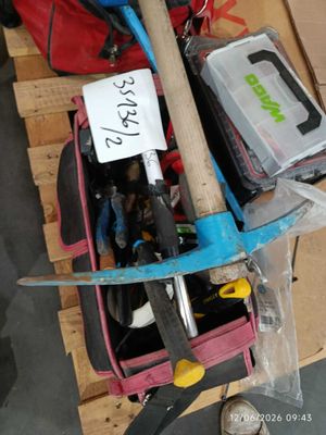 a pile of tools sitting on top of a wooden pallet
