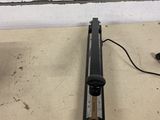 a hair dryer sitting on a table next to a wall