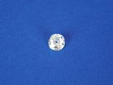 a diamond on a blue surface