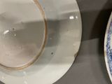 two plates that are sitting on a table