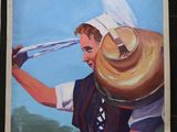 posters on the wall of a restaurant with a picture of a woman carrying a water pitcher